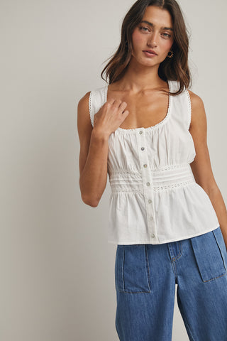 Wishlist off white cotton lace trimmed sleeveless peplum blouse WL25-11887 stock photo