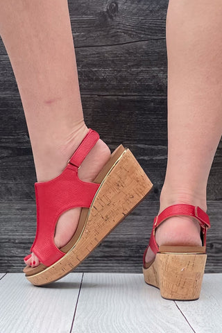 Corkys Footwear Carley wedge sandal in bold red lizard with gold rand trim around corky outsole