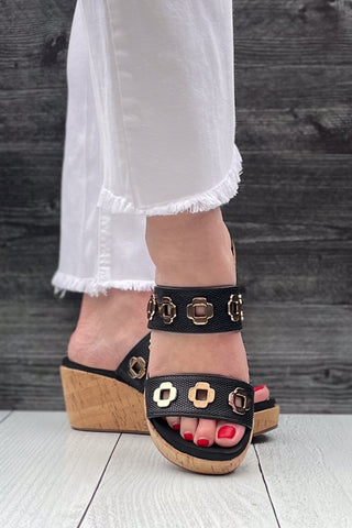 Corkys Footwear Hi Tide Wedge Sandal in Black with Gold Floral Rivets