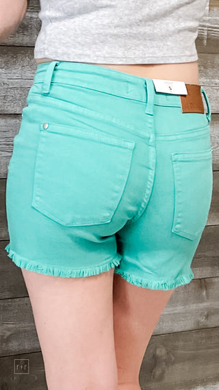 judy blue aquamarine garment dyed mid rise fray hem shorts JB150281REG