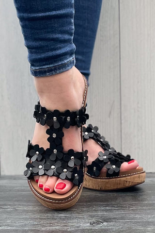 Corkys Footwear Mic Drop Wedge Sandal with Flower Details in Black