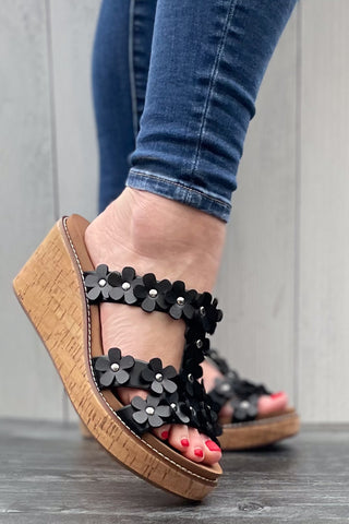 Corkys Footwear Mic Drop Wedge Sandal with Flower Details in Black