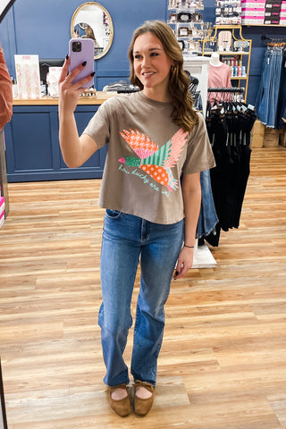 Full-length view of the How Ducky Are We mocha crop tee with Just Black longer length straight leg jeans