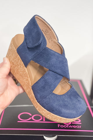 Corkys Footwear Case Closed criss cross wedge shoe in navy faux suede velcro closure