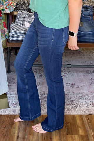 cello pull on flares with elastic waist in dark wash short length side view