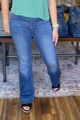 cello pull on flares with elastic waist in medium wash long length front view