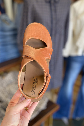 Corkys Footwear cognac Bring It In lower heel wedge closed toe shoe criss cross straps and ankle strap closure top view