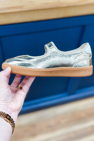 Corkys Footwear Calm Down mary jane style sneaker in metallic gold with 2 white stripes and heel detail inside view