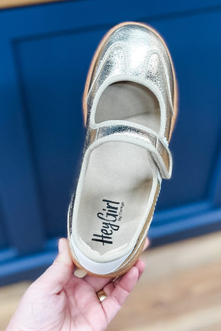 Corkys Footwear Calm Down mary jane style sneaker in metallic gold with 2 white stripes and heel detail top view