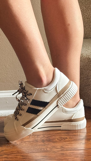 corkys footwear thats her casual sneaker white with black stripes and leopard laces