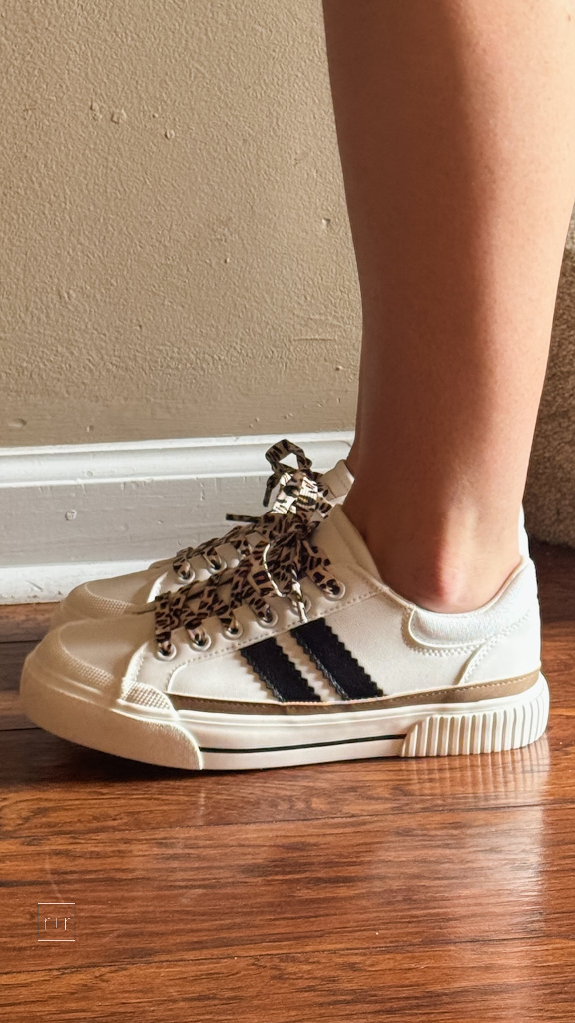 corkys footwear thats her casual sneaker white with black stripes and leopard laces