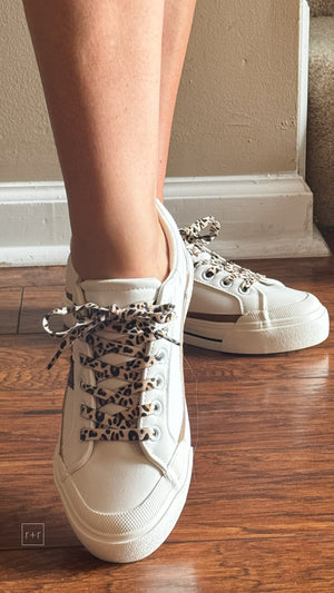 corkys footwear thats her casual sneaker white with black stripes and leopard laces