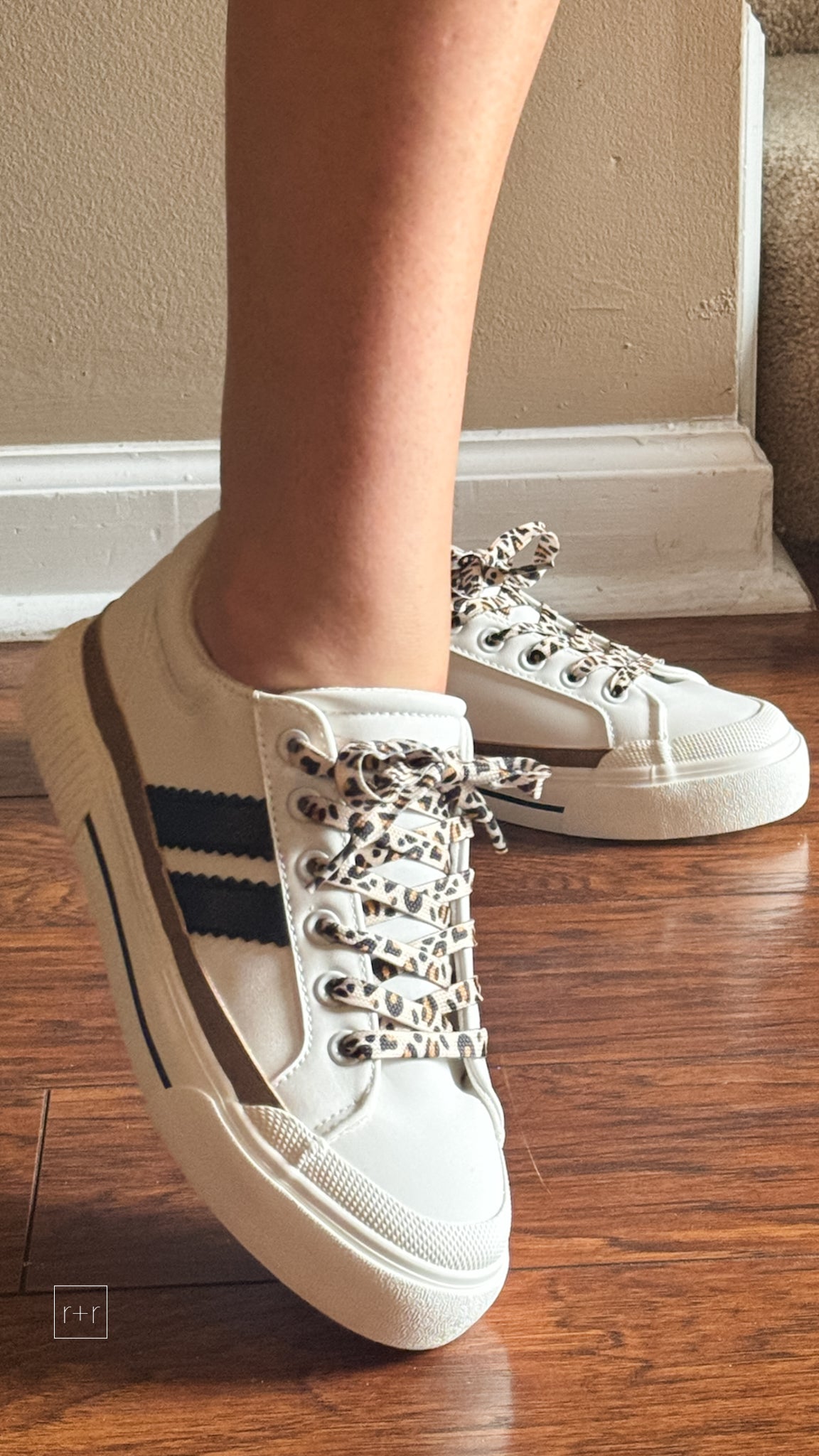 corkys footwear thats her casual sneaker white with black stripes and leopard laces