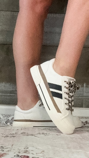 corkys footwear thats her casual sneaker white with black stripes and leopard laces