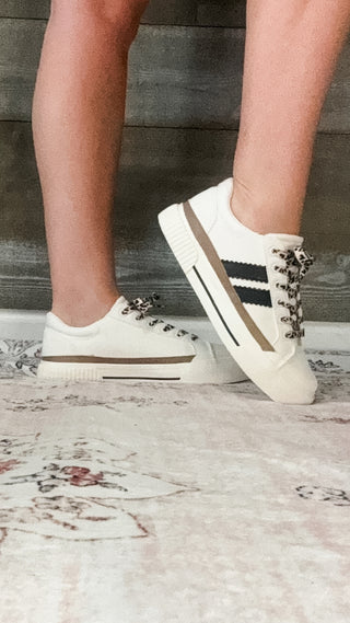 corkys footwear thats her casual sneaker white with black stripes and leopard laces