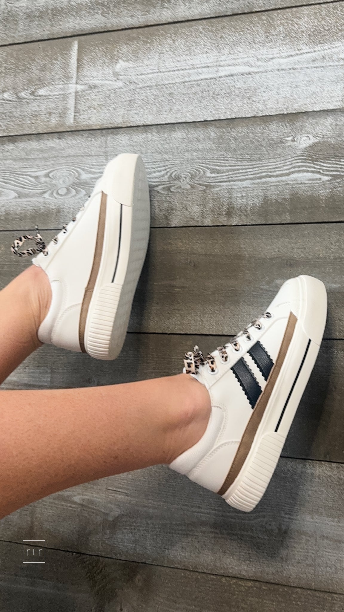 corkys footwear thats her casual sneaker white with black stripes and leopard laces