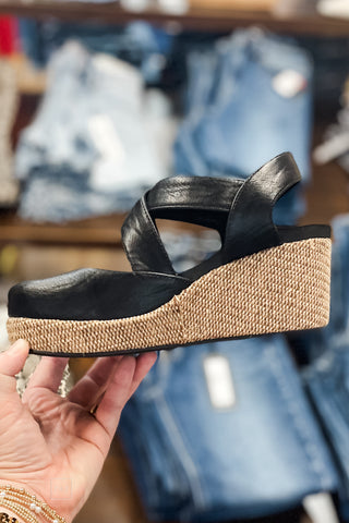 Corkys Footwear Black Whats The Rush Criss Cross Wedge Closed Toe Shoe with raffia-wrapped heel inside view
