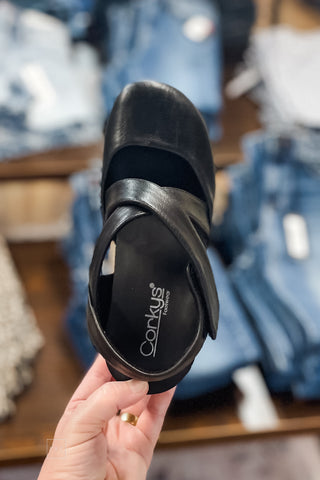 Corkys Footwear Black Whats The Rush Criss Cross Wedge Closed Toe Shoe with raffia-wrapped heel top view