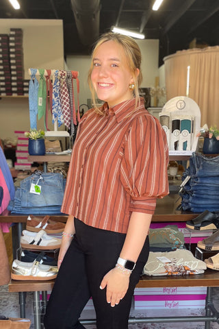 Side view of the ee:some striped half bubble sleeve blouse TH17233 highlighting the half balloon sleeve and button cuff
