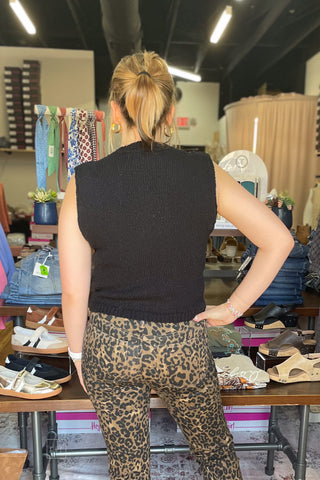eesome Black Button Down Sleeveless Cardigan SJK16699 back view, paired with leopard jeans
