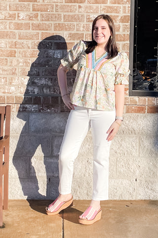 eesome light olive green with all over pastel floral pattern and colorful embroidery framing v-neck with short puff sleeves and elastic ruffle cuff TK14695