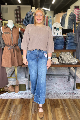 Entro mocha knit short sleeve sweater silver shoulder embellishments T33464 paired with Risen Crop Wide Leg Jeans front view
