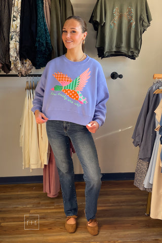 Full-length front view of the Poppy & Pine How Ducky Are We purple crop sweatshirt showing the cropped length and relaxed fit