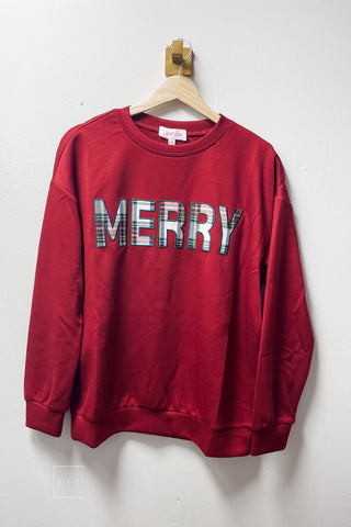Red Jess Lea Merry Plaid Patch Luxe Pullover Christmas sweatshirt with tartan plaid MERRY patch lettering, shown on a hanger