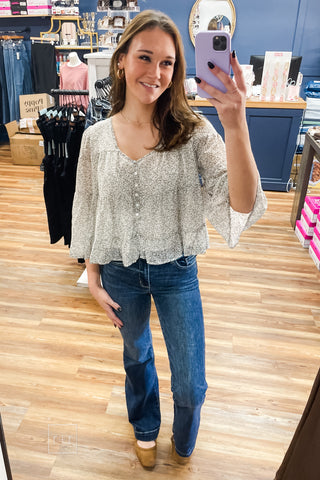 Full length mirror photo of Judy Blue 82637 high waist dark wash trouser flare jeans styled with the Wishlist Ditsy Floral Tiered Blouse WL26-13747