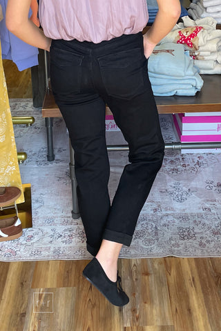 Judy Blue High Waist Aurora Weekender Jeans in Jet Black JB881217 close up back view of the high waist and slim straight leg, worn with an ee:some lavender bubble hem sleeveless top and Corkys Layover black ballet flats