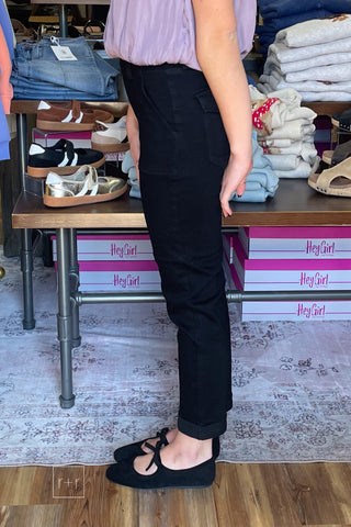 Judy Blue High Waist Aurora Weekender Jeans in Jet Black JB881217 side view showing the high rise and slim straight leg with Corkys Layover black ballet flats