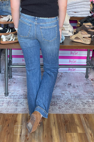 Back view of Judy Blue petite tummy control flare jeans 881018PT showing the back pockets and medium wash