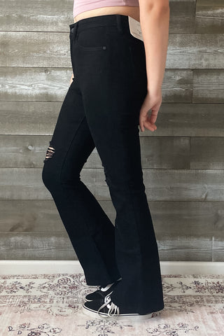 kancan petite high rise flare jeans in black with distressed knees KC7346BKV2-PT