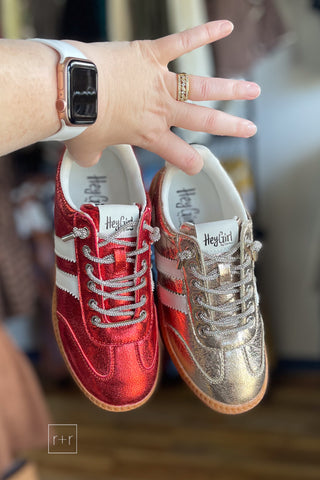 Hey Girl By Corkys Heads Up metallic sneakers in red and gold both with sparkly laces