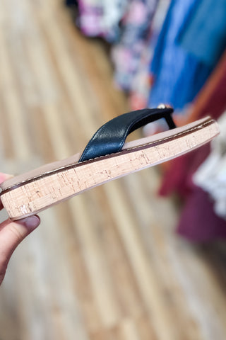 Corkys Footwear Off The Deep End Thong Flip Flop Sandals in Black with low wedge and cushioned insole. gold button charm detail