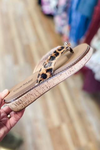 Corkys Footwear Off The Deep End Thong Flip Flop Sandals in Leopard with cushioned memory foam insole and gold button charm detail