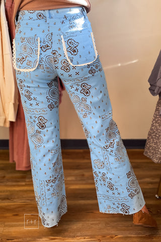 Back view of Poppy & Pine light blue paisley bandana jeans with lace-trimmed back pockets