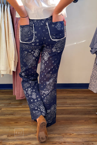Back view of Poppy & Pine navy paisley bandana jeans with lace-trimmed back pockets