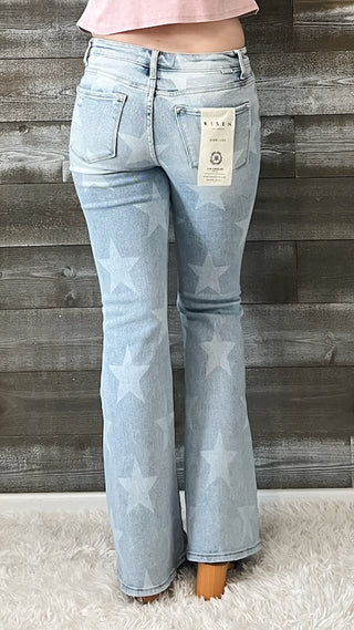 risen mid rise light wash star print flare button down jeans RDP5691