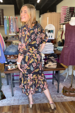 Angled view of the Umgee K0651 fall floral tiered midi dress with 3/4 sleeves and v-neck
