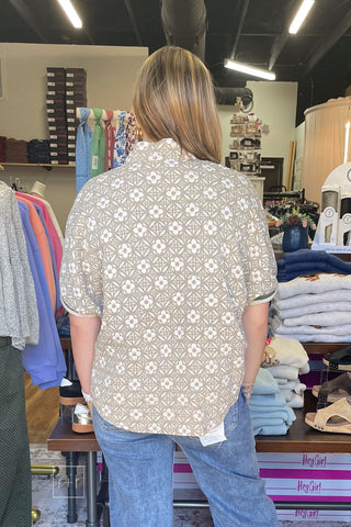 Back view of the Umgee taupe jacquard floral top C6449 showing the textured floral jacquard and relaxed fit, worn with Risen cropped wide leg jeans.