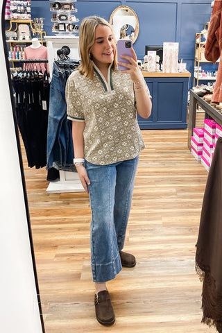 Full-length mirror view of the Umgee taupe jacquard floral top C6449 styled with Risen cropped wide leg jeans and Corkys Distracted mules.