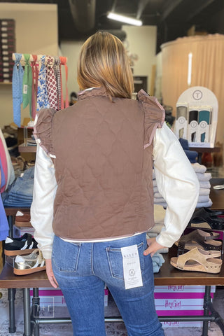 Back view of the Umgee C6829 reversible mocha quilted ruffle vest showing the wavy quilting and ruffle shoulders