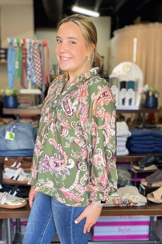 Close-up of the smocked V-neck and paisley print on the Umgee N7201 floral long sleeve blouse