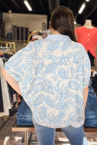 Umgee blue and cream botanical print with contrast stripe trim dolman short sleeve blouse K1776