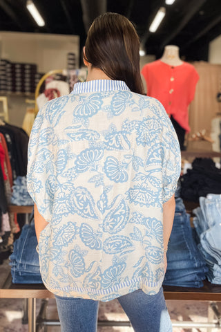 Umgee blue and cream botanical print with contrast stripe trim dolman short sleeve blouse K1776