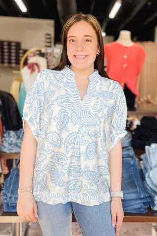 Umgee blue and cream botanical print with contrast stripe trim dolman short sleeve blouse K1776