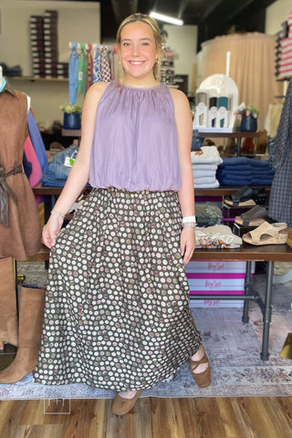 Umgee C6942 olive pleated maxi skirt showing the flowy A-line shape