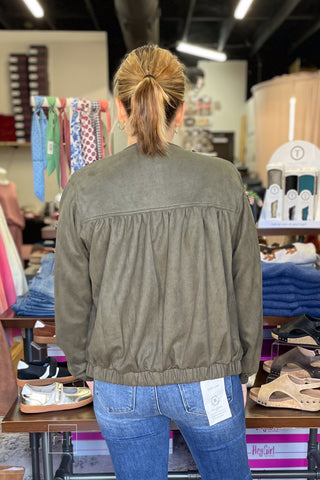 Back view of the Umgee Shayla olive suede-look zip up jacket N7068 showing the horizontal yoke seam and gathered back