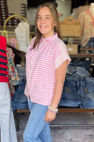 Umgee Peony Pink Short Sleeve Gingham Button Top Contrast Striped placket and shoulders C6333 paired with light wash denim side view